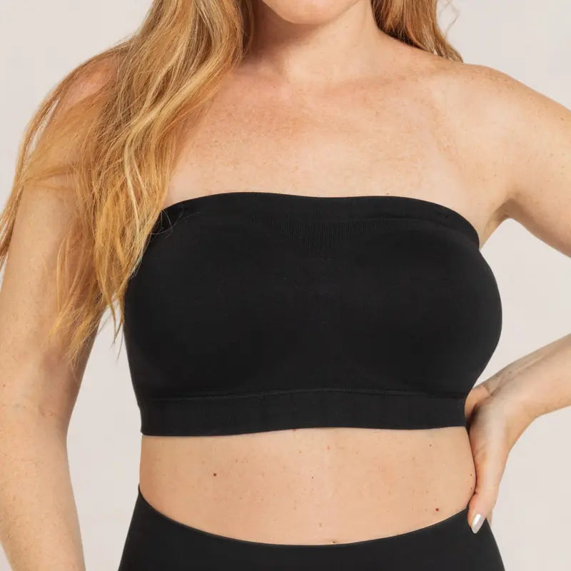 Woman wearing black seamless strapless bandeau top