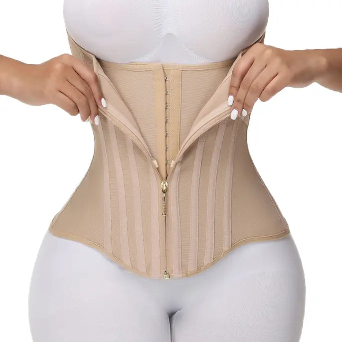 Woman wearing nude double-zip waist trainer corset