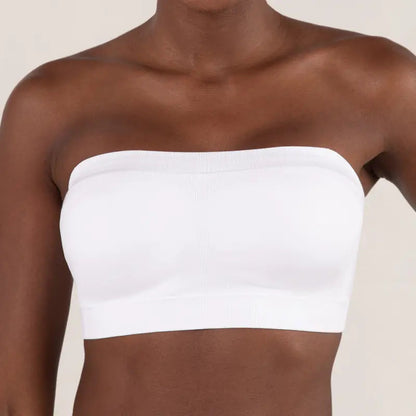 Woman wearing white seamless strapless bandeau top